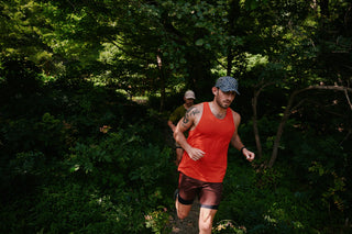 Running apparel laid out in daylight