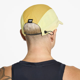 FSTCap SC - Comp - Iconic VC - Dark Ochre/Sulfur – on model